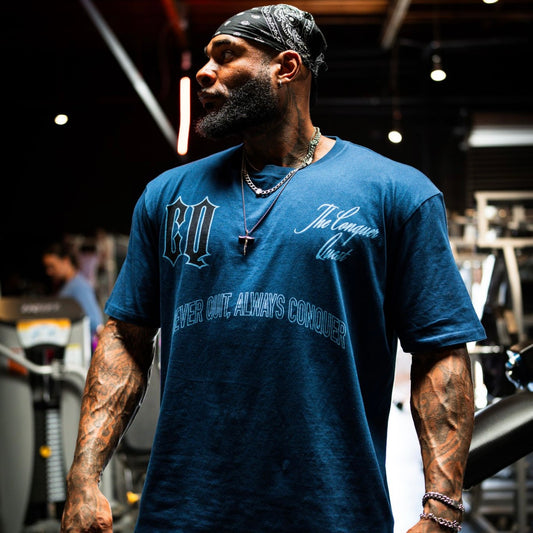 Oversized Blue “Never Quit Always Conquer” Tee