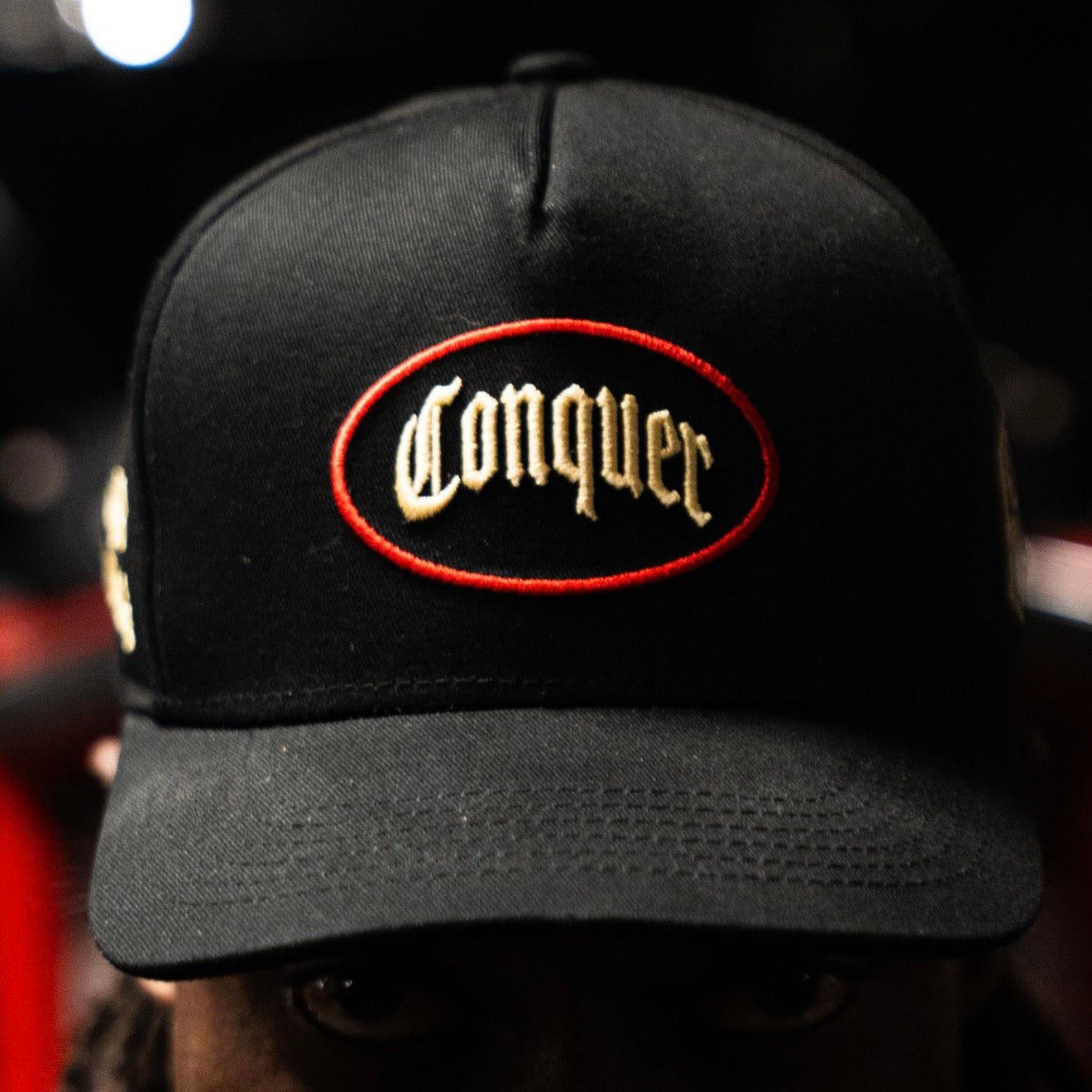 Black/Red/Gold "CONQUER" Hat